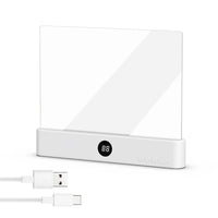 White electronic device with digital display and USB cable on a white background